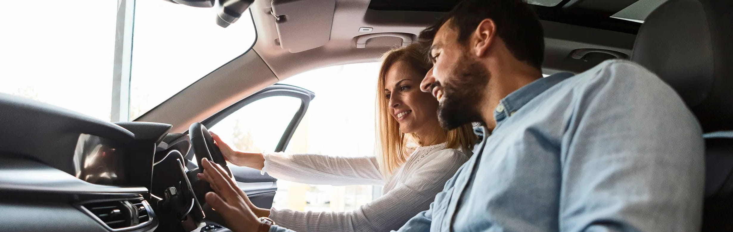 Man and woman inside car