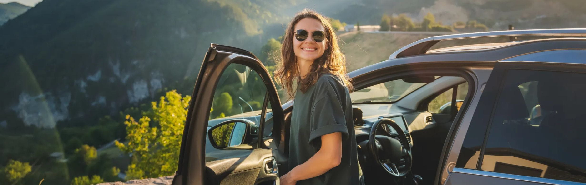 Woman next to car